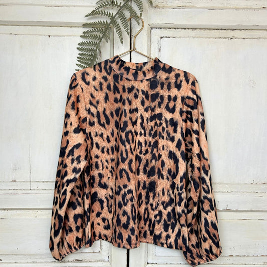 Top, Maat M